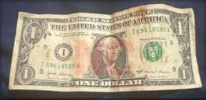 Angel Smith said her son used this dollar to pay for a drink at Dollar General on W. Cumberland Street in Dunn, NC but was refused because it was "too dirty."