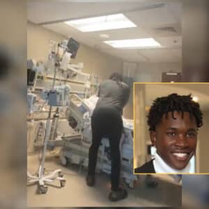 Anthony Allen performing CPR on his son, Terrance "T" Howard.