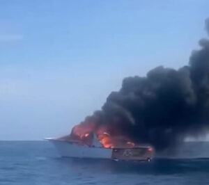 Raptor boat on fire during Big Rock Blue Marlin Tournament at sea