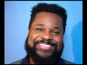 Malcolm-Jamal Warner all smiles
