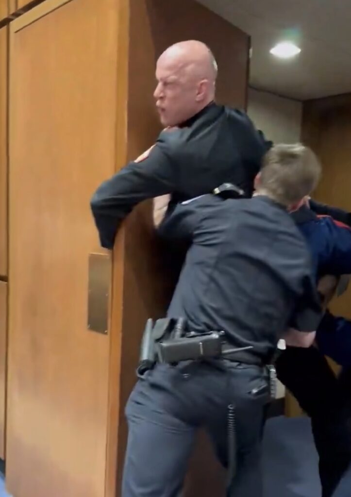 brian mcginnis capitol police doorway protest arrest