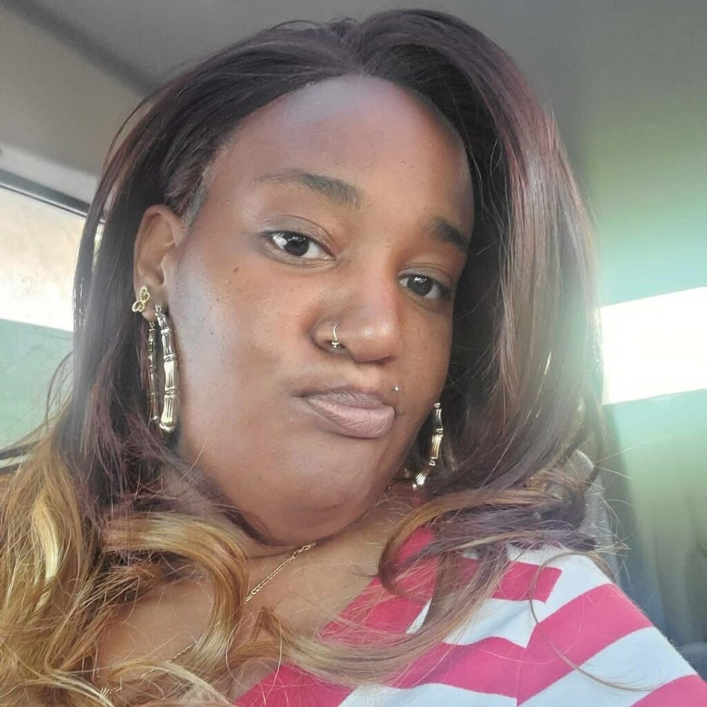 Tyesha Marie Moody seen in viral video throwing liquid during a heated argument with a horse-drawn funeral coachman.