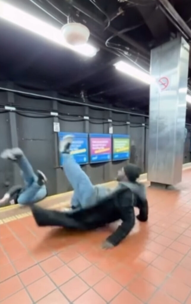 Two men in confrontation before one is punched and falls onto train tracks at SEPTA train station.