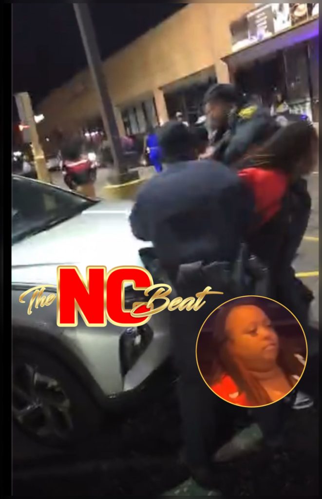 Woman getting arrested while a fight breaks out nearby outside Crazy D's Sports Pub in Fayetteville.