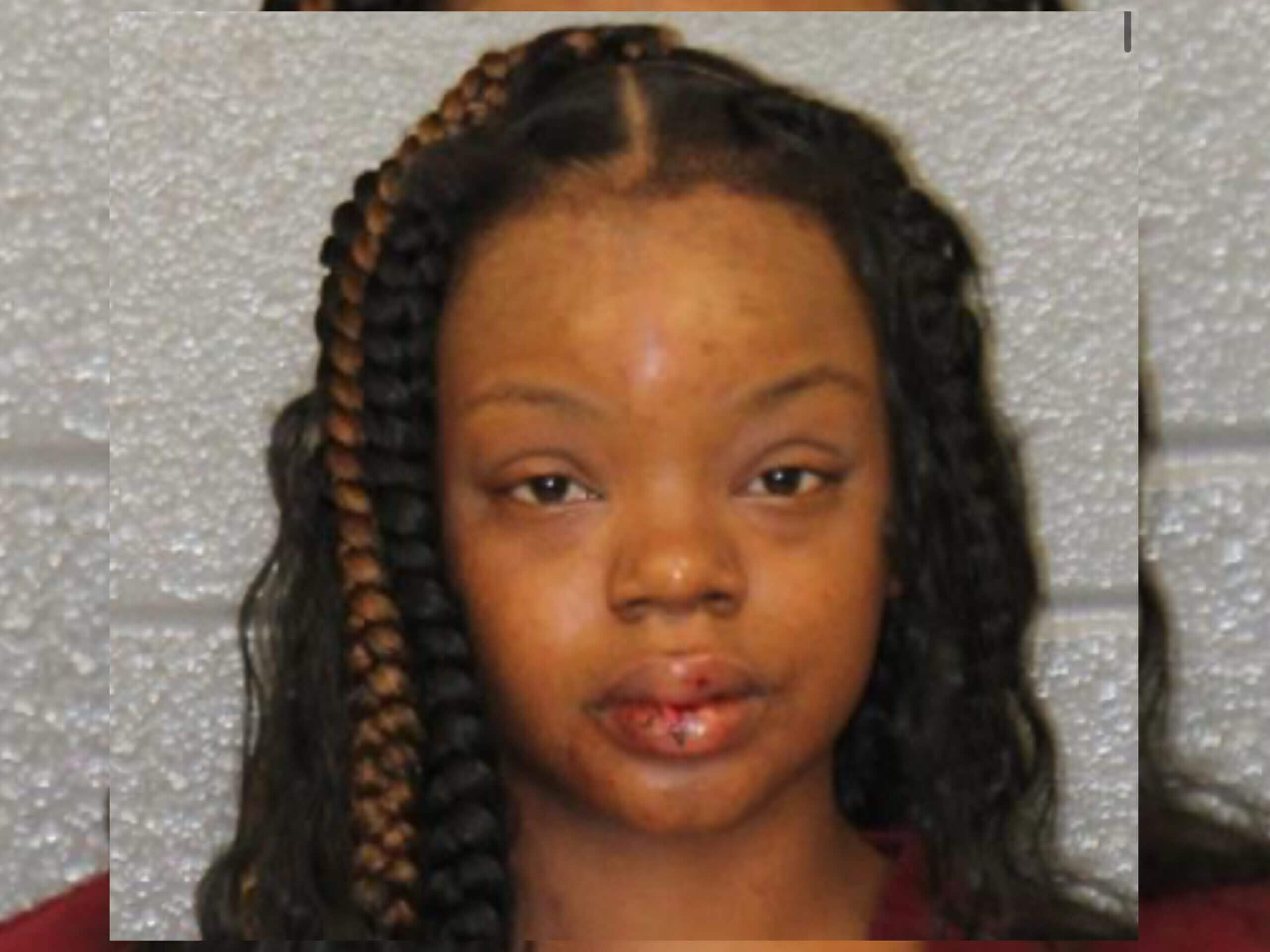 Mugshot of Nieasha Wingo, charged with domestic violence for pepper spraying boyfriend in Charlotte.