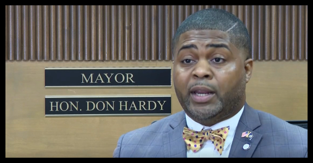Kinston Mayor Don Hardy faces criticism over increased travel expenses and the city's rising budget.