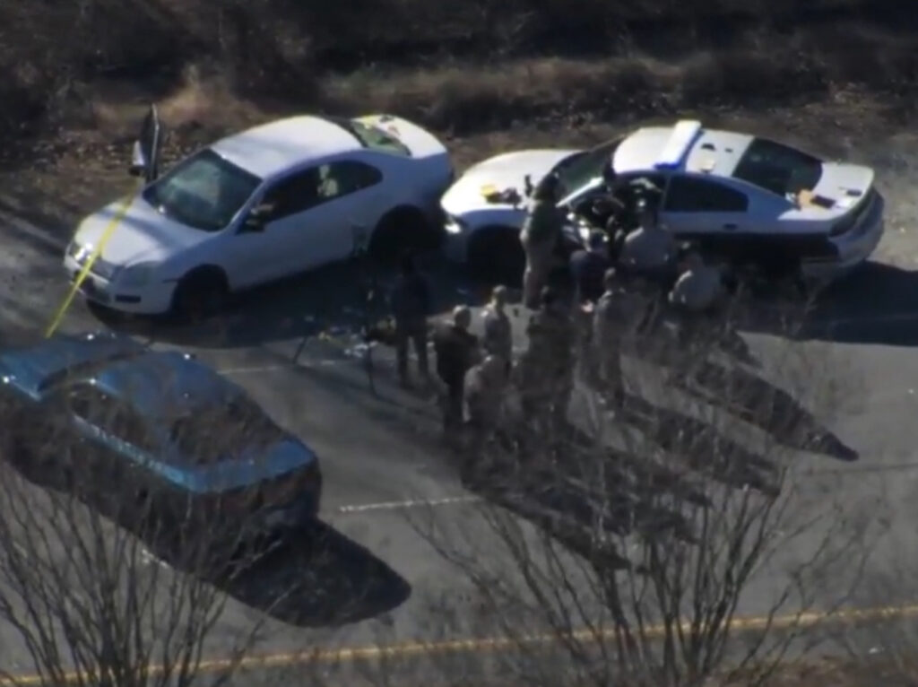 White car shown during greensboro shooting investigation on US 421 South (Photo credit: WRAL News)
