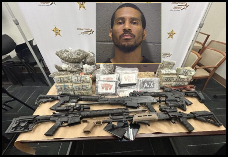 Multiple assault rifles and seized drugs displayed on a table following a major Durham drug bust