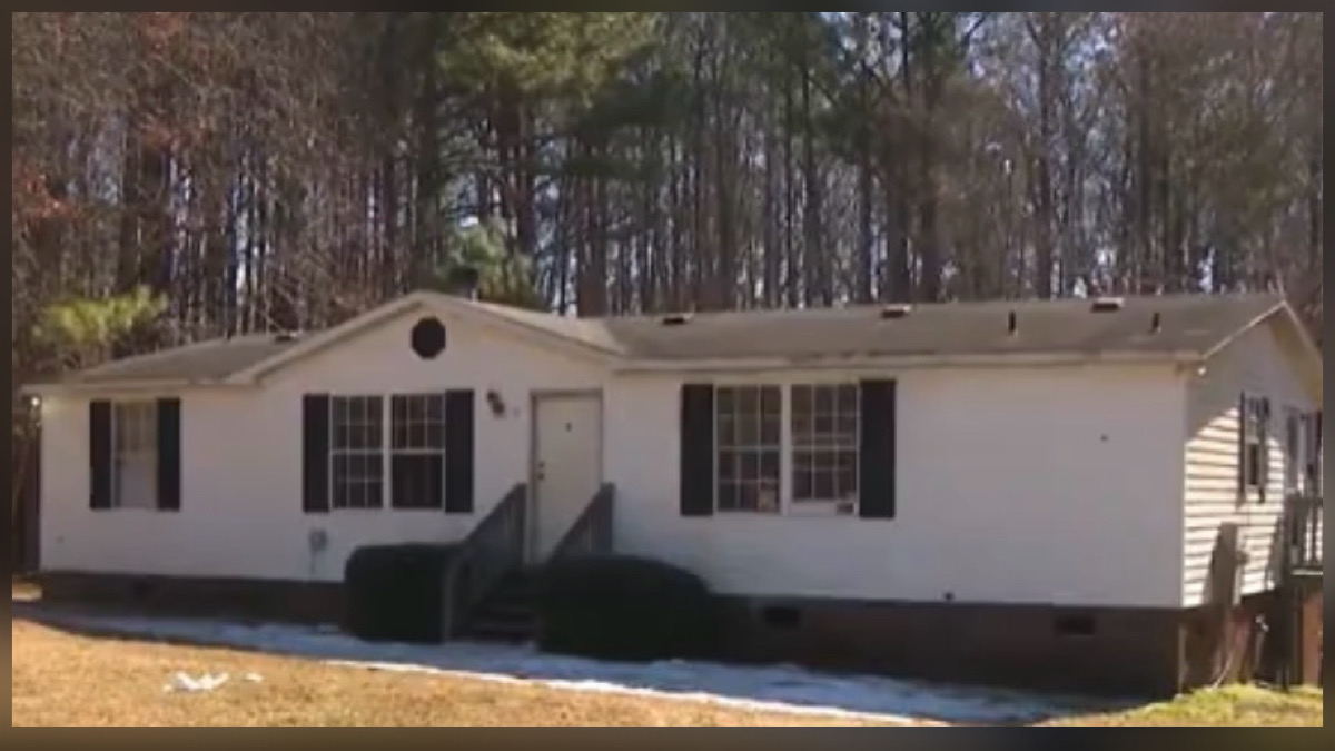 Exterior view of the Vance County home where a brother and sister were found dead