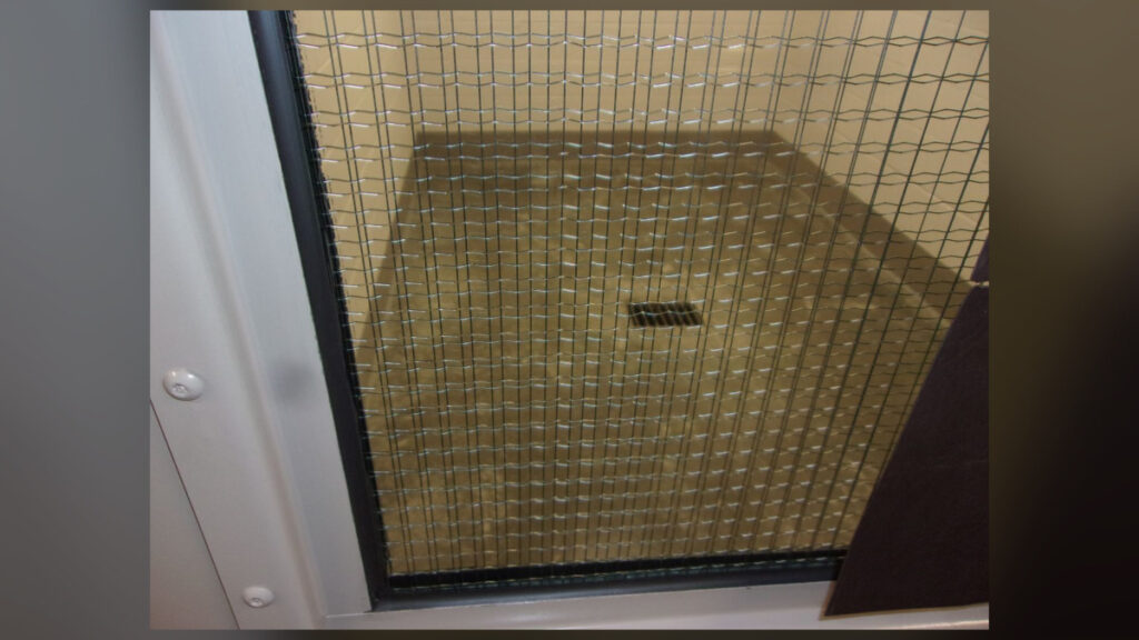 Locked room inside North Carolina juvenile detention centers where youth report spending up to 23 hours a day.