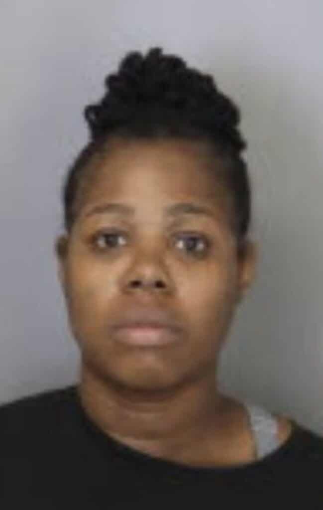 Booking photo of Kendra Scott, 36, accused of shooting Rodderius Morton
