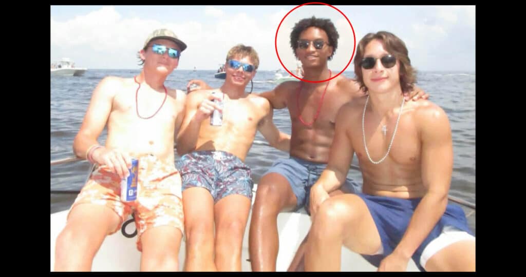 Nolan Xavier Wells (circled) with friends on a boat during their July 4, 2026 trip to Horn Island